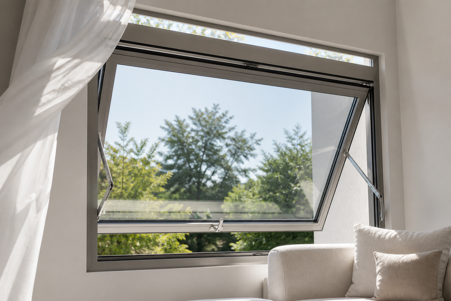 Interior view of an aluminum glass awning window opened about 30 degrees with stainless restrictor arms visible at both sides, curtain moving in the breeze, no hardware close-up