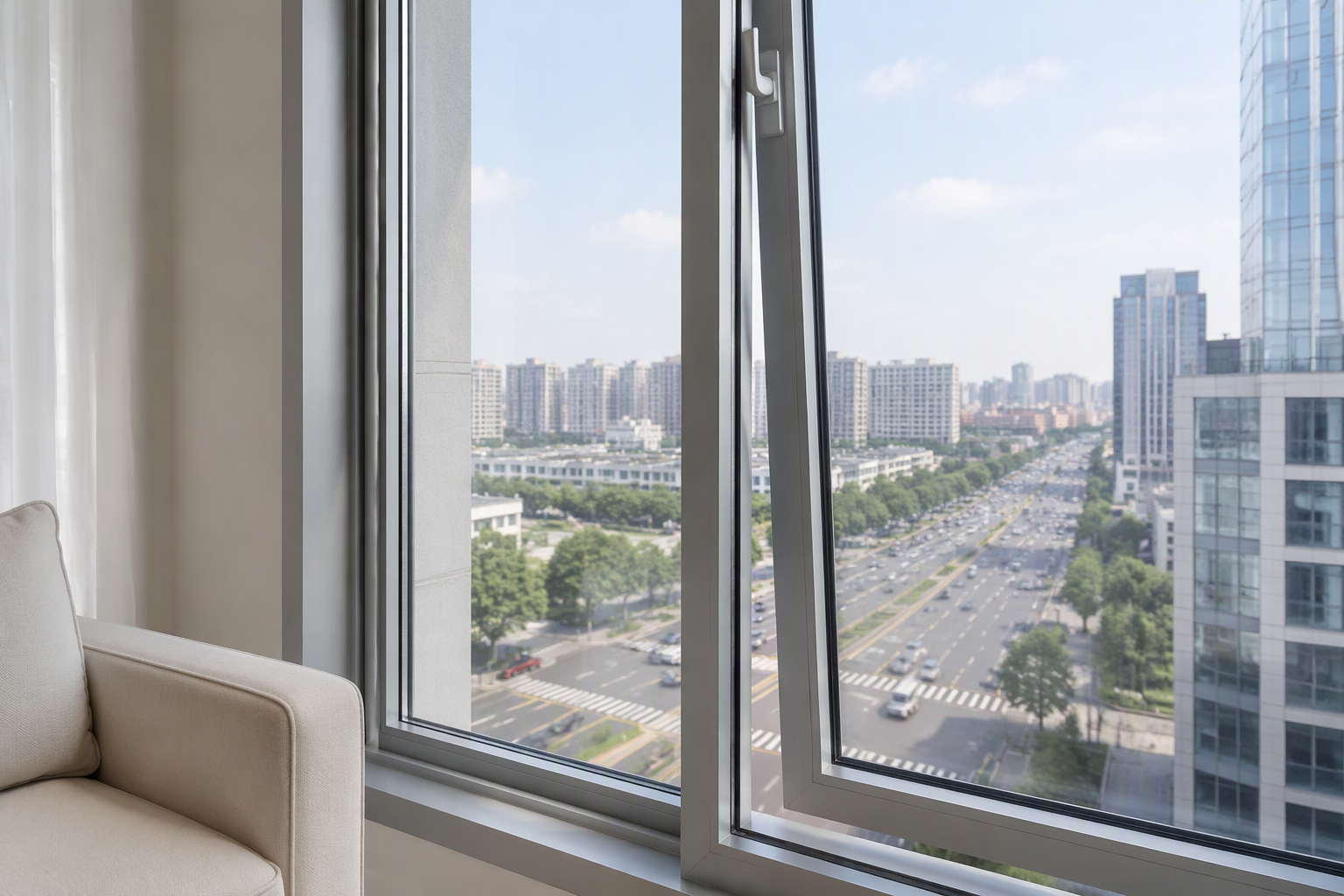 Aluminum acoustic window in a high-rise apartment, one sash slightly open showing a clear narrow gap between the sash and the frame, city street and traffic beyond, no hardware close-up